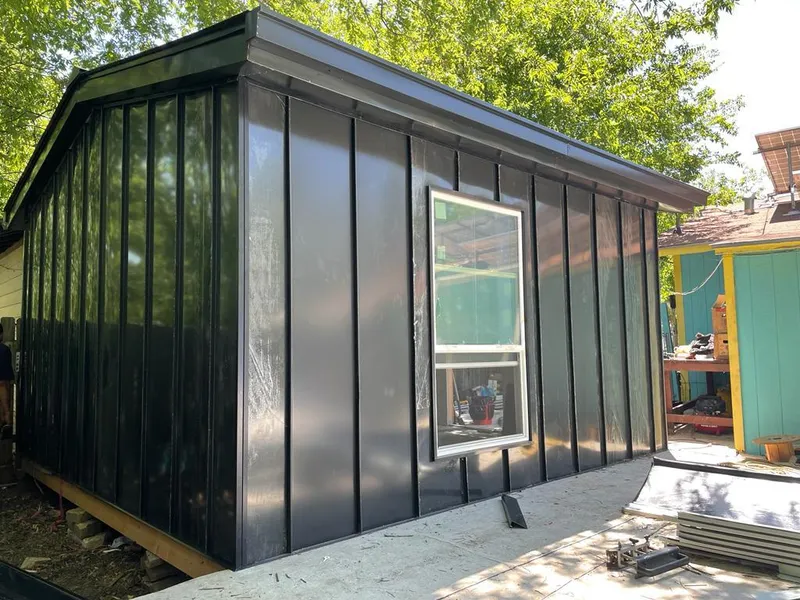 Black standing seam metal wall panels for Roof Inspection in Montville